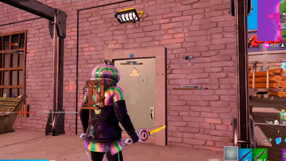 Fortnite wallhack showing enemy markers through a brick wall with distance tags